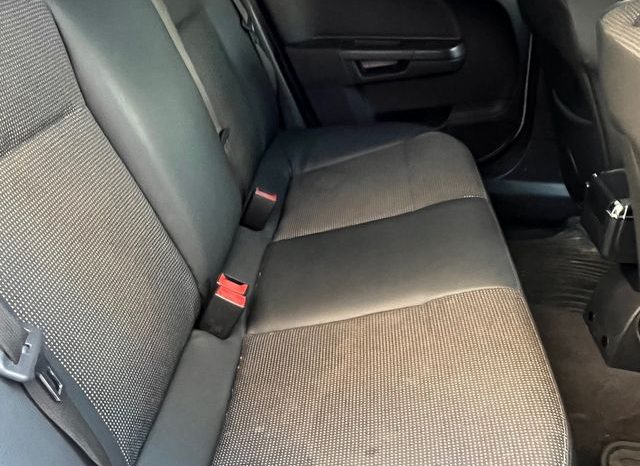 
								Opel Astra 2009 lleno									