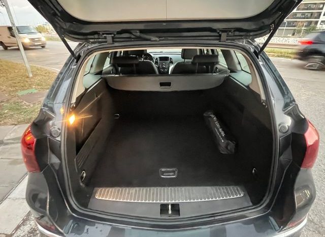 
								Opel Astra 2015 lleno									