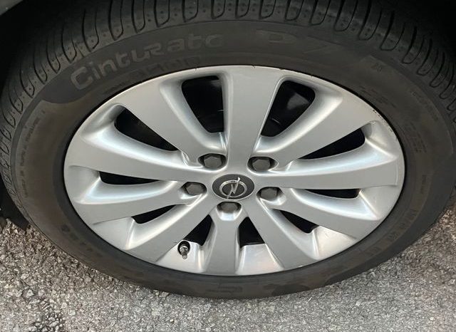 
								Opel Astra 2015 lleno									