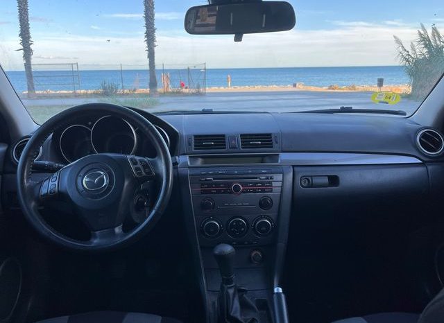 
								MAZDA 3 2008 lleno									