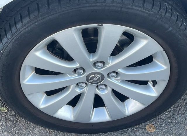 
								Opel Astra 2012 lleno									