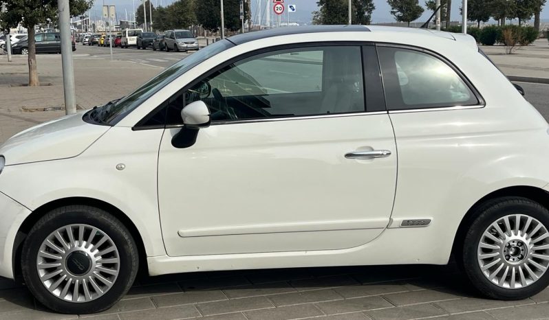 
								Fiat 500 2010 lleno									