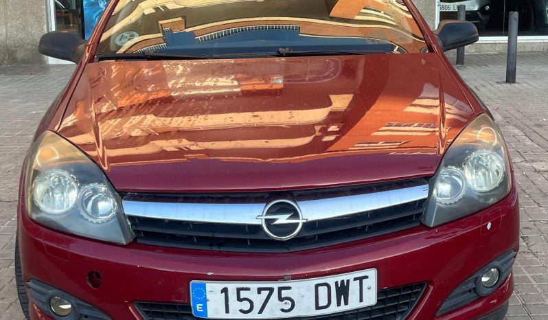 
								Opel Astra 2006 lleno									