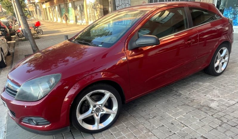 
								Opel Astra 2006 lleno									