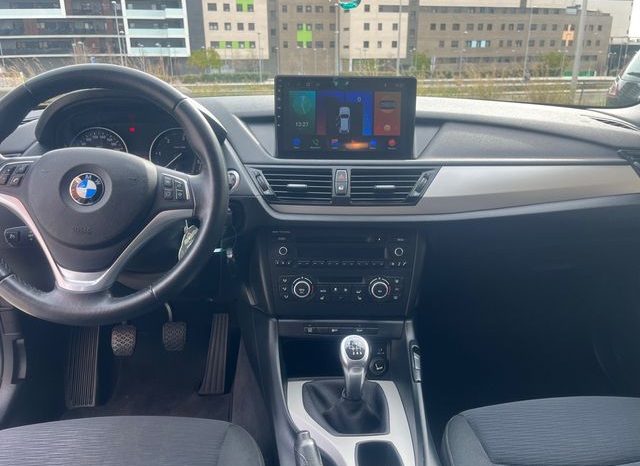 
								BMW X1 2014 lleno									