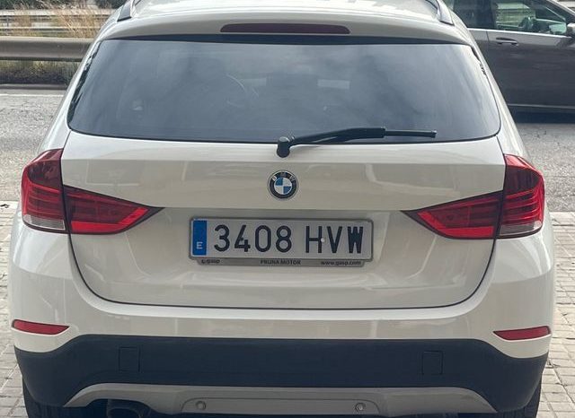 
								BMW X1 2014 lleno									