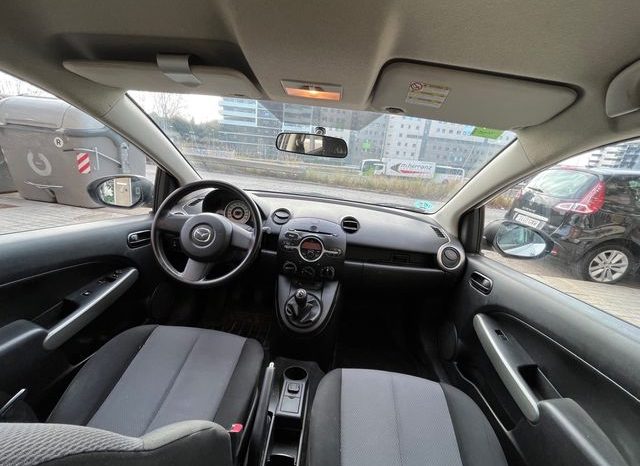 
								Mazda 2 2010 lleno									