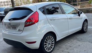 
									Ford Fiesta 2011 lleno								