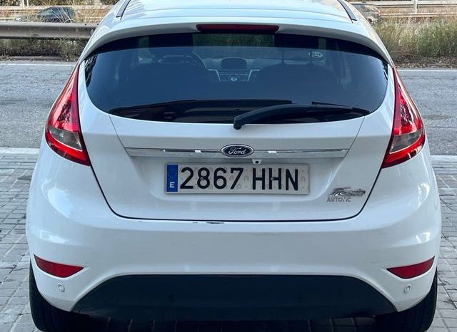 
								Ford Fiesta 2011 lleno									