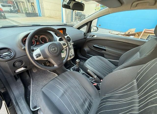 
								Opel Corsa 2007 lleno									