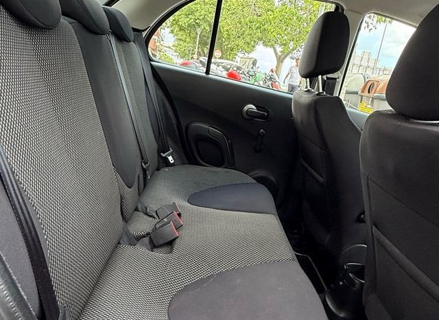
								Nissan Micra 2010 lleno									