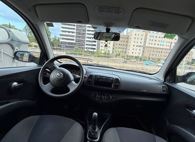 
								Nissan Micra 2010 lleno									
