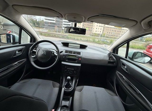 
								Citroën C4 2010 lleno									
