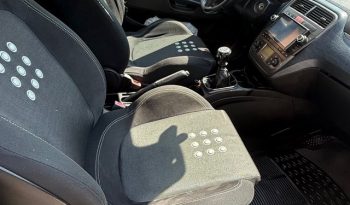 
									Fiat Punto 2008 lleno								