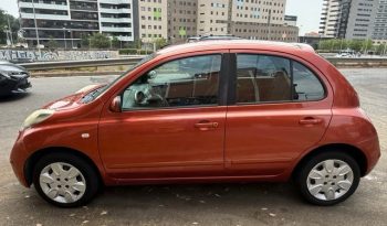 
									Nissan Micra 2010 lleno								